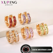 Laadukkaat korvakorut valkoisilla tai värillisillä zirkoniakivillä