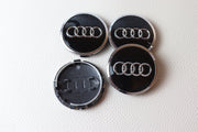 Audi Kromi-Mustat 61mm Vannekeskiöt (4kpl sarja)