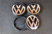 Volkswagen Kromi-Mustat 55mm Vannekeskiöt (4kpl sarja)