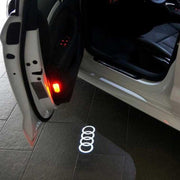 Audi logolliset ovivalot — heijasta logo maahan (2kpl)