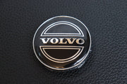 Volvo 60mm mustat vannekeskiöt ; Vanha tyyli (4kpl sarja)