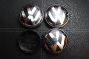 Volkswagen Kromi-Mustat 65mm Vannekeskiöt (4kpl sarja)