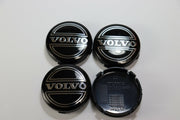 Volvo mustat vannekeskiöt ; Vanha tyyli ; 64mm (4kpl sarja)