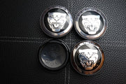 Jaguar kromi-mustat 59mm vannekeskiöt (4kpl sarja)