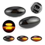Peugeot / Citroen Dynaamiset LED sivuvilkut aaltoefektillä ; Tumma/Kirkas kotelo (2kpl sarja)
