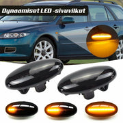Mazda / Ford I-MAX LED aaltoefekti sivuvilkut ; Tumma/Kirkas kotelo (2kpl sarja)