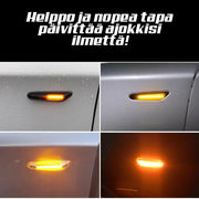 BMW sivuvilkut aaltoeffektillä ; Dynaaminen LED ; Tumma/Kirkas kotelo (2kpl sarja)