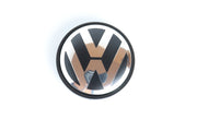 Volkswagen kromi-mustat 56mm vannekeskiöt (4kpl sarja)